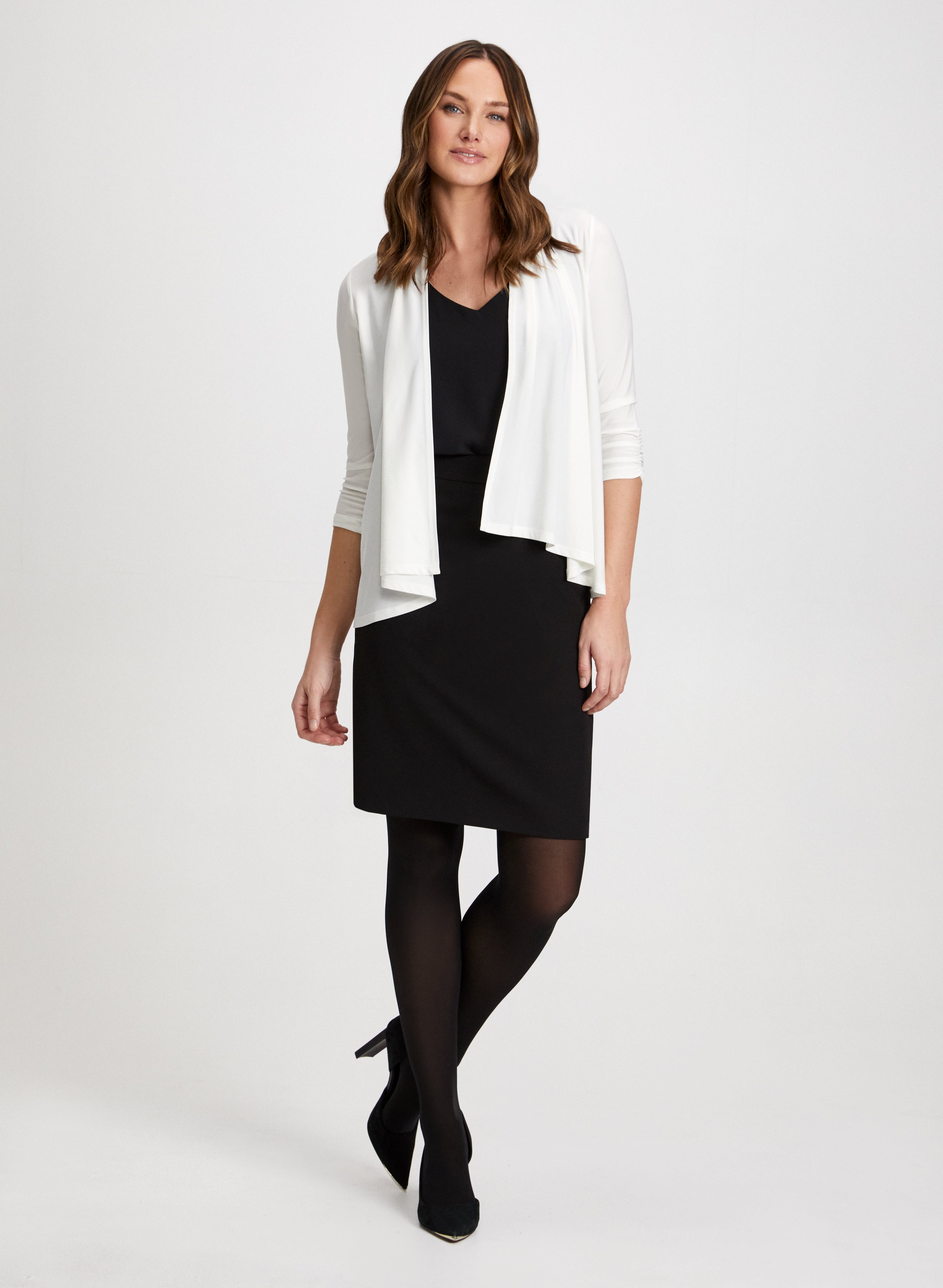 Black dress and cardigan outfit top